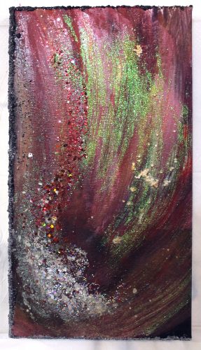 Abstract comet of red, green and silver color